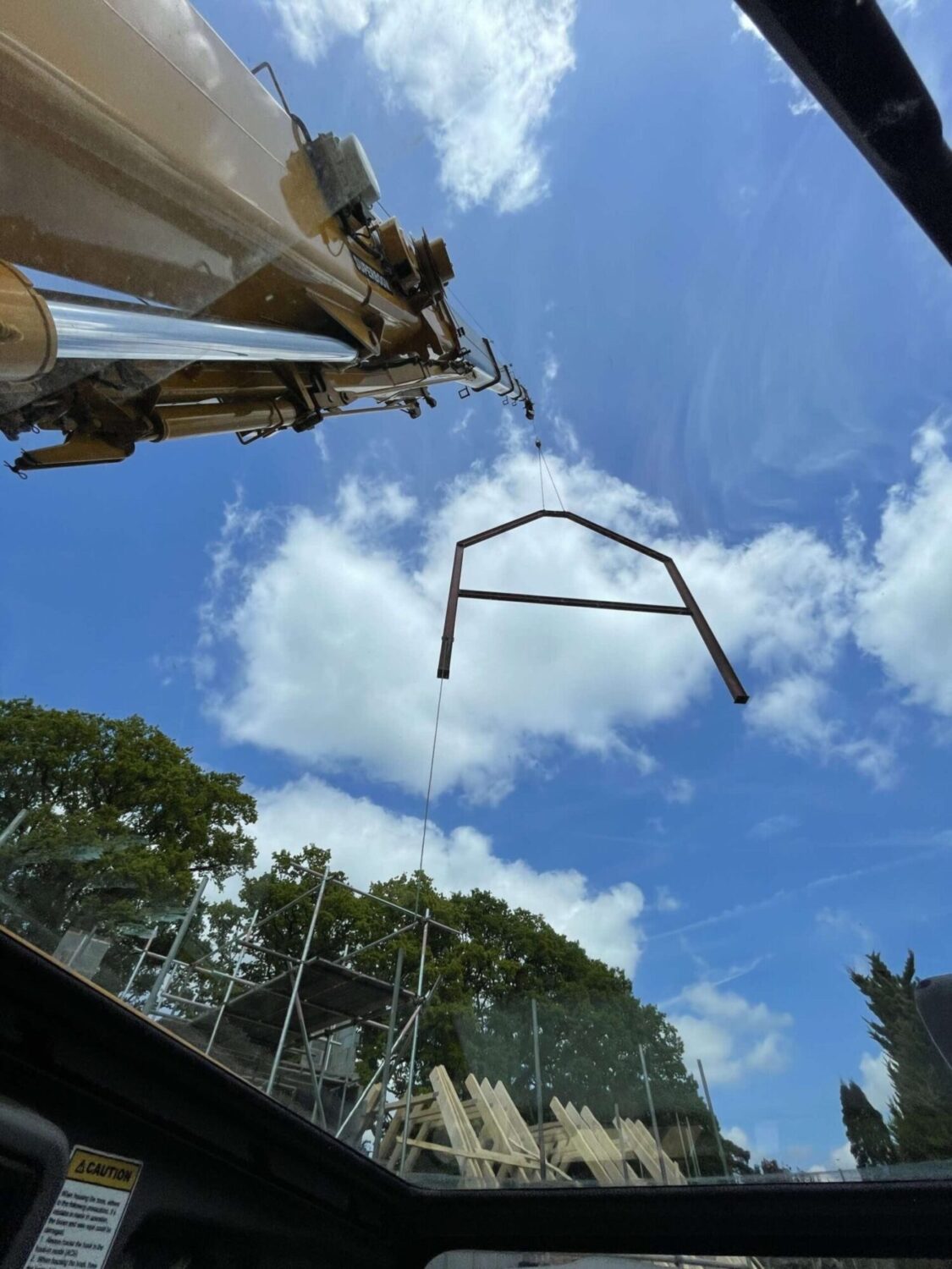 Mobile crane lifting steel gable