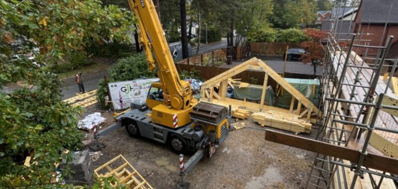 Mobile crane lifting components for a timber framed house